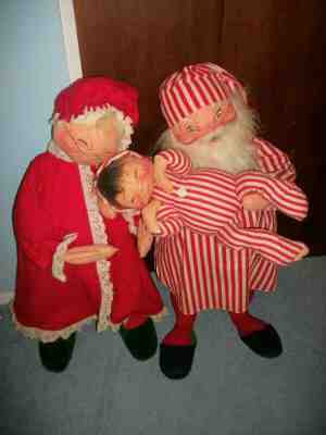 Vintage set 1989-90 Annalee 30" Mr. and Mrs. Tuckered Santas with child dolls.
