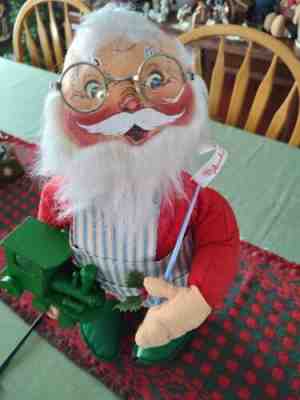 Annalee Motorized 18" Santa, very rare, works well. Head and arm move smoothly.Â 