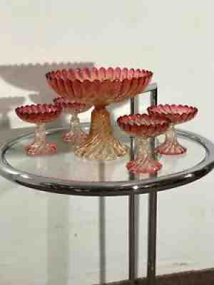 A five-piece baccarat depose glass rose tiente swirl compote/tazza