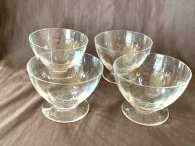 Rare Discontinued Baccarat Fleur champagne coupe, set of four.