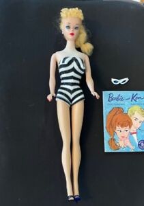 vintage 1960 Pony Tail Barbie doll with clothing outfits and case, one owner.