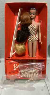 barbie with 3 wigs