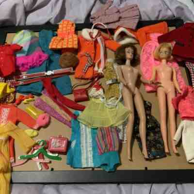 Vintage 1960â??s Tlc Barbies and a large lot of clothing and accessories!