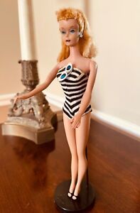 Vintage Barbie 1959 with wardrobe and case. Plus Ken doll. By Mattel made /Japan
