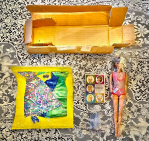 Rare 1968 Barbie Doll in unopen box. Plus gown, paisslie dress, stand, shoes...