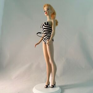 Barbie #3 Blonde Blue Eye Poodle Bangs includes dozens of outfits & accessories