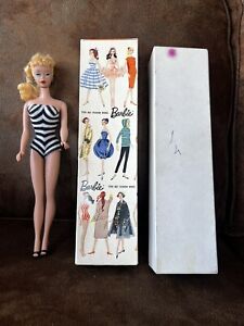 New price!!   Vintage Barbie. Stock No. 850. Outfits And Case Included.
