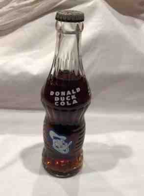 Vintage Donald Duck Cola Bottle FULL With Cap Walt Disney Soda Pop