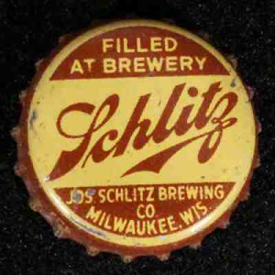 SCHLITZ â?¢FILLED AT BREWERYâ?¢ BROWN CORK BEER BOTTLE CAP MILWAUKEE WISCONSIN CROWN
