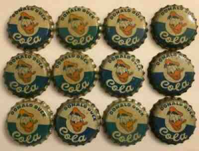 12 DONALD DUCK COLA SODA BOTTLE CAPS; SALEM, MASS.; WALT DISNEY; UNUSED CORK