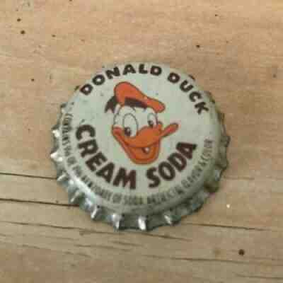 DONALD DUCK CREAM---COLA BOTTLE CAP--SODA BOTTLE CAPS !!!