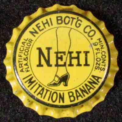 NEHI IMITATION BANANA SODA UNUSED CORK LINED BOTTLE CAP COLUMBUS, GEORGIA CROWNS