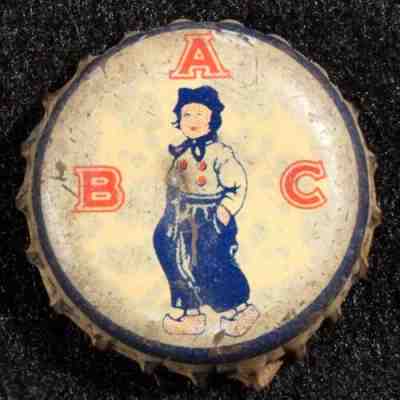 "ABC" DUTCH BOY CORK BEER BOTTLE CAP AMSTERDAM BREWING NEW YORK NY ANTIQUE CROWN