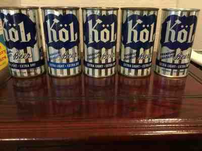 Five Kol Beer empty flat top beer cans; five different breweries.