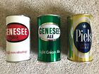 2 Genesee and one Piels flat top beer cans