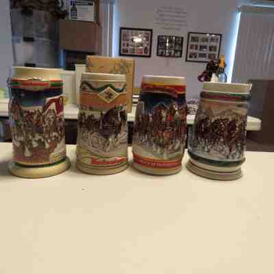 SET OF 4 BUDWEISER HOLIDAY STEINS