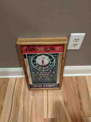 Vintage Budweiser vs. Bud Light NFL Football Clock Mirror Bar Sign