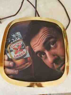 1960s Lucky Lager 2 Sided Beer Sign RARE Johnny Carson & Ski Scene Tattered CORD