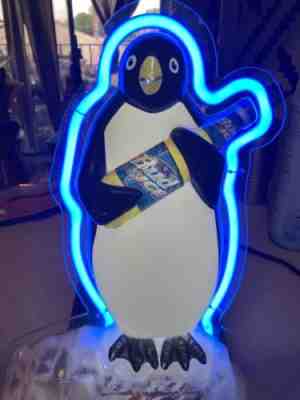 bud ice promo penguin holding bud ice blue and white neon sign