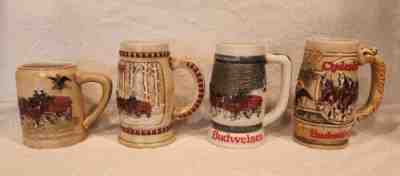 4 Budweiser Holiday Series Steins 1980 CS19, 1981 CS50, 1982 CS57, 1983 CS58 ð???