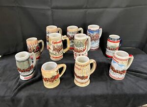 1980-1990, 11 Vintage Budweiser Holiday Christmas Steins Excellent Condition