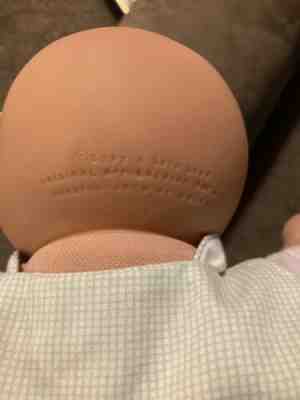 Vintage, cabbage kid doll with accessories Premie Boy made in 1985.