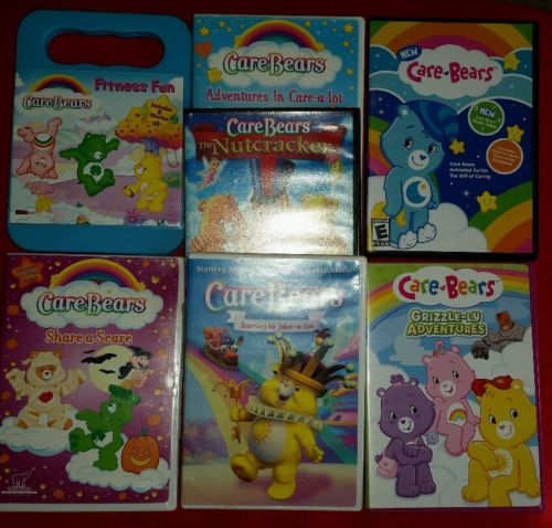 7 awesome CARE BEARS DVDs / rom lot. Over 20 episodes stories movies plus game.