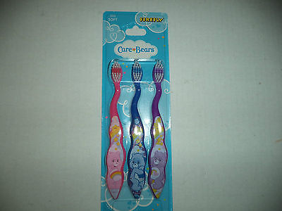 Firefly Three Pack Care Bears Soft Bristle Toothbrushes Pink Blue And Purple 