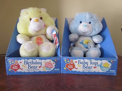 Two Vintage plush Care Bear 1984 Birthday & 1985 Baby Tugs Bear boxes with tags