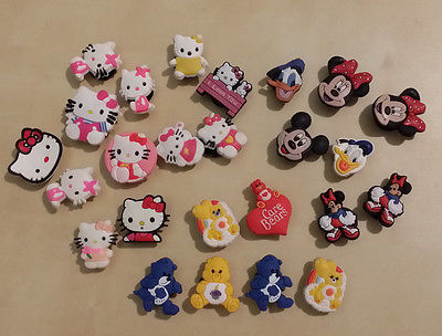 Lot of 25 Jibbitz Shoe or Bracelet Charms Hello Kitty Disney Care Bears