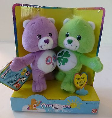 New in package Care Bears Cuddle Pairs Share & Good Luck Bear 