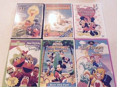 Lot of 6 kids movies -Curious George, MIckey Mouse, Sesame Street and Care Bears