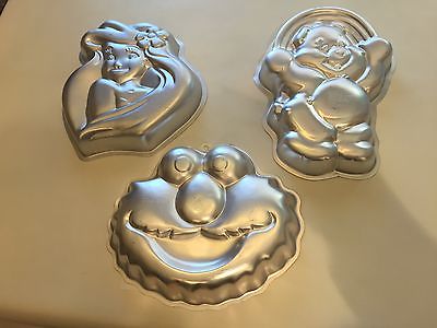 Three Wilton Cake Pans/Molds - Care Bear, Ariel and Elmo
