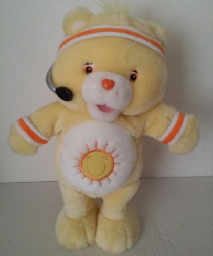 CARE BEAR INTERACTIVE  PLUSH TOY THAT  SINGS AND WORKOUT 