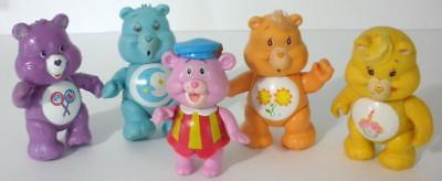 Four 1983 Care Bears PVC Figures With Cubbi Gummi Bear Figure