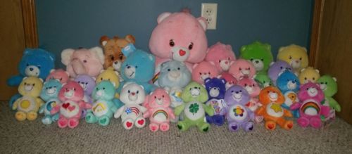 Mixed care bear lot of 32 care bears, carebear cousins,  assorted sizes & years