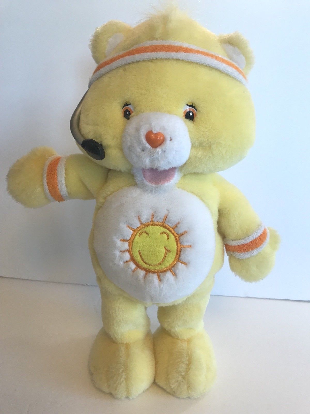 2004 FIT N FUN YELLOW FUNSHINE CARE BEAR SINGING PLUSH TOY