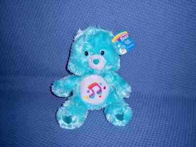 care bear with music note