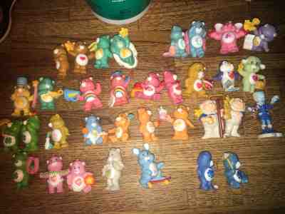 Vintage Care Bears and Cousins —- LOT of 33 figurines and a case