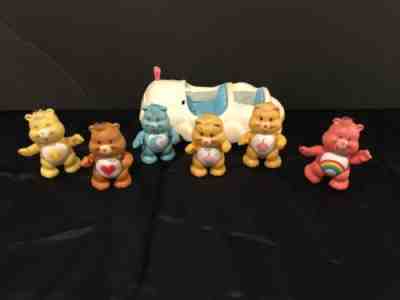 VINTAGE CARE BEARS CAR AND (6) POSE-ABLE CARE BEARS FIGURINES 1980’s