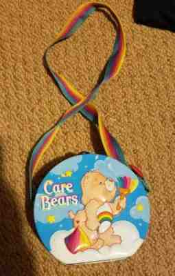 Care Bears Embossed Collector’s Tin Purse Rainbow Colored Adjustable Strap 