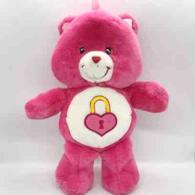 pink care bear with heart lock