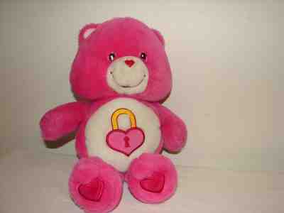 pink care bear with heart lock