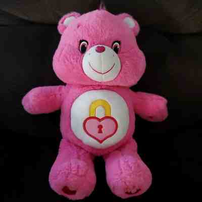 pink care bear with heart lock