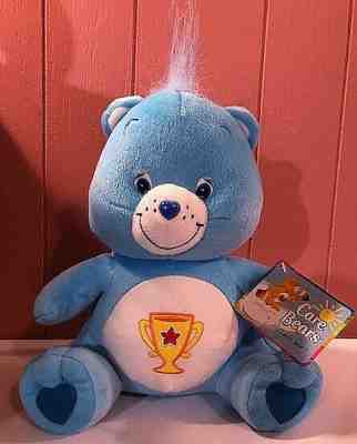 BRAND NEW W/ TAGS~CARE BEARS CHAMP BEAR BLUE PLUSH~TROPHY ON BELLY~? IN EXC COND