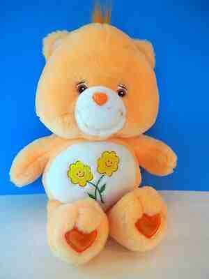 13 Inch Orange Care Bear with 2 Flowers on Tummy