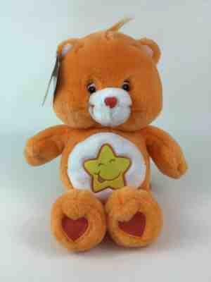 Care Bears Laugh-a-Lot Bear Singing Orange Teddy Bear Plush Stuffed Toy New Tags