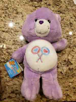 purple care bear with lollipops