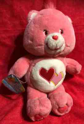pink care bear with heart