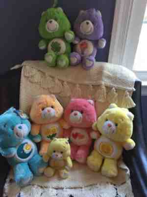 Care Bears Lot Of 7 Plush Stuffed Toy Animal 13” And one 7”.